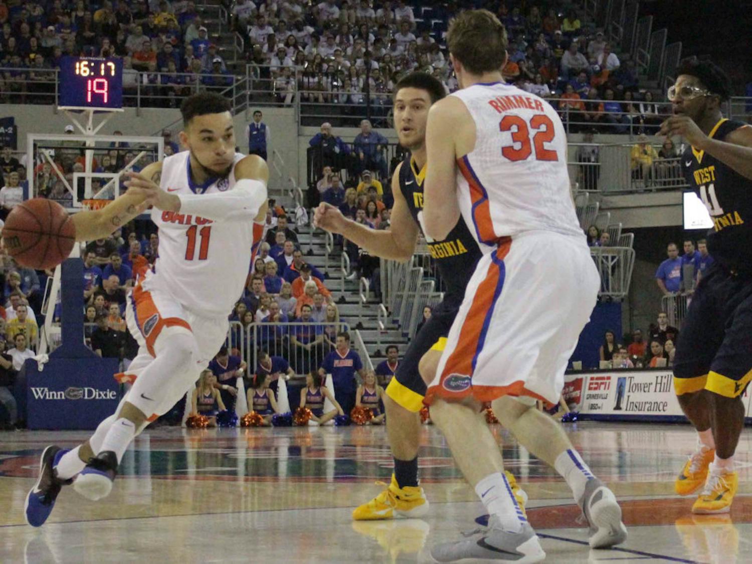 Chris Chiozza drives into the paint during Florida’s win over West Virginia on Jan. 30, 2016, in the O’Connell Center.