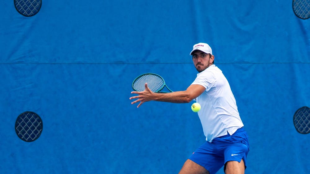  Florida’s Lorenzo Claverie returns the ball in a NCAA men's singles tennis match against Oklahoma, Sunday, March 29, 2026, in Gainesville, Fla.