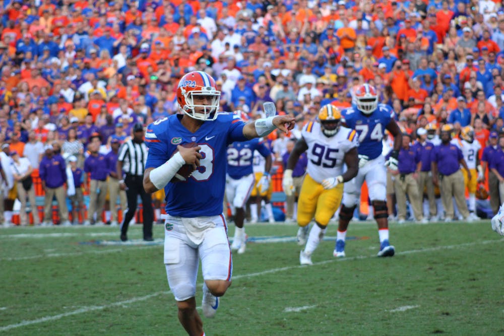 <p>UF quarterback Feleipe Franks calls out for a block while running with the ball during Florida's 17-16 loss to LSU on Saturday at Ben Hill Griffin Stadium.</p>