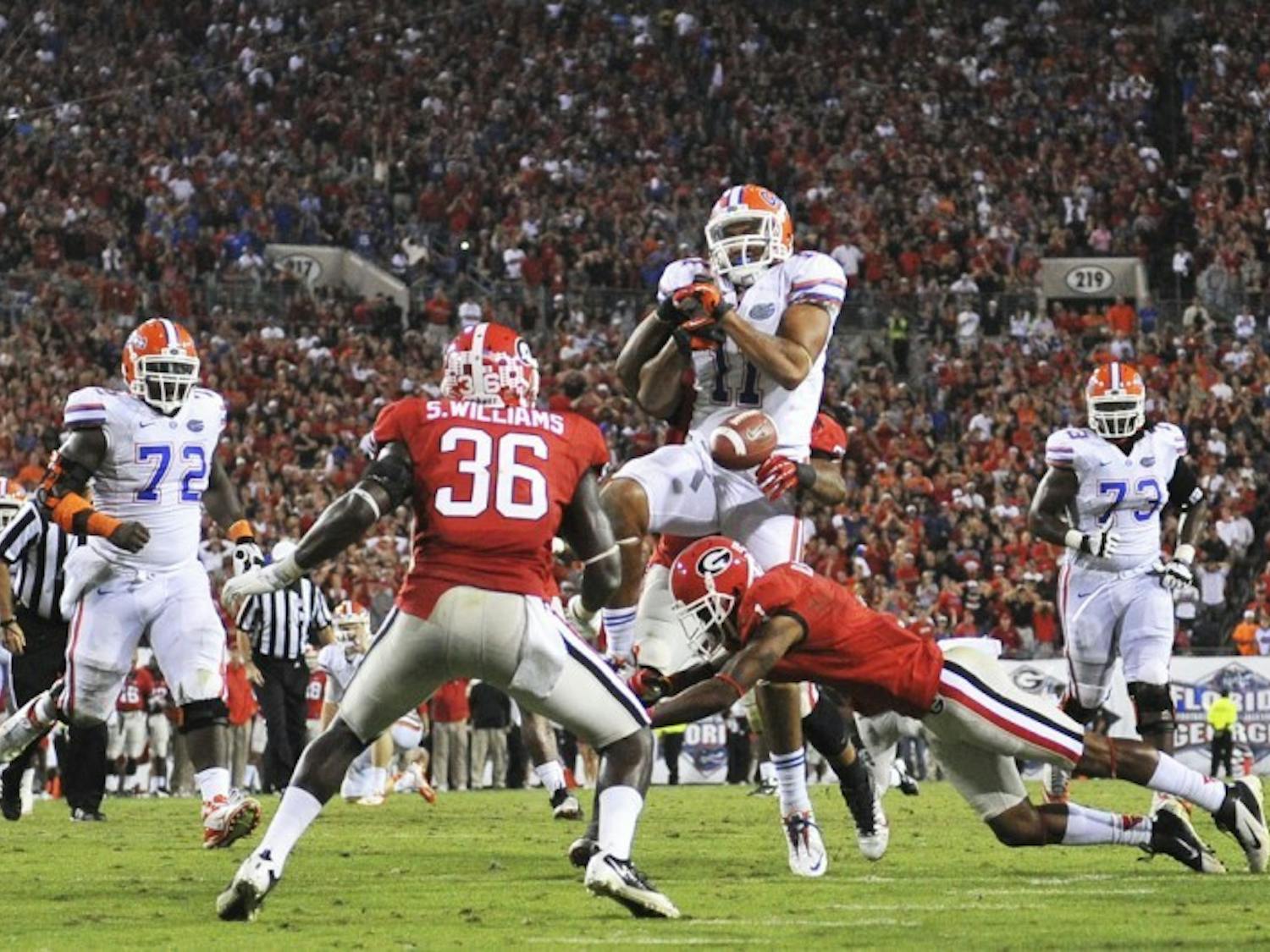 Tight end Jordan Reed (11) fumbles on Georgia’s 5-yard line late in the fourth quarter during Florida’s 17-9 loss to UGA on Saturday at EverBank Field in Jacksonville. The Gators’ six turnovers proved costly in the defeat.
