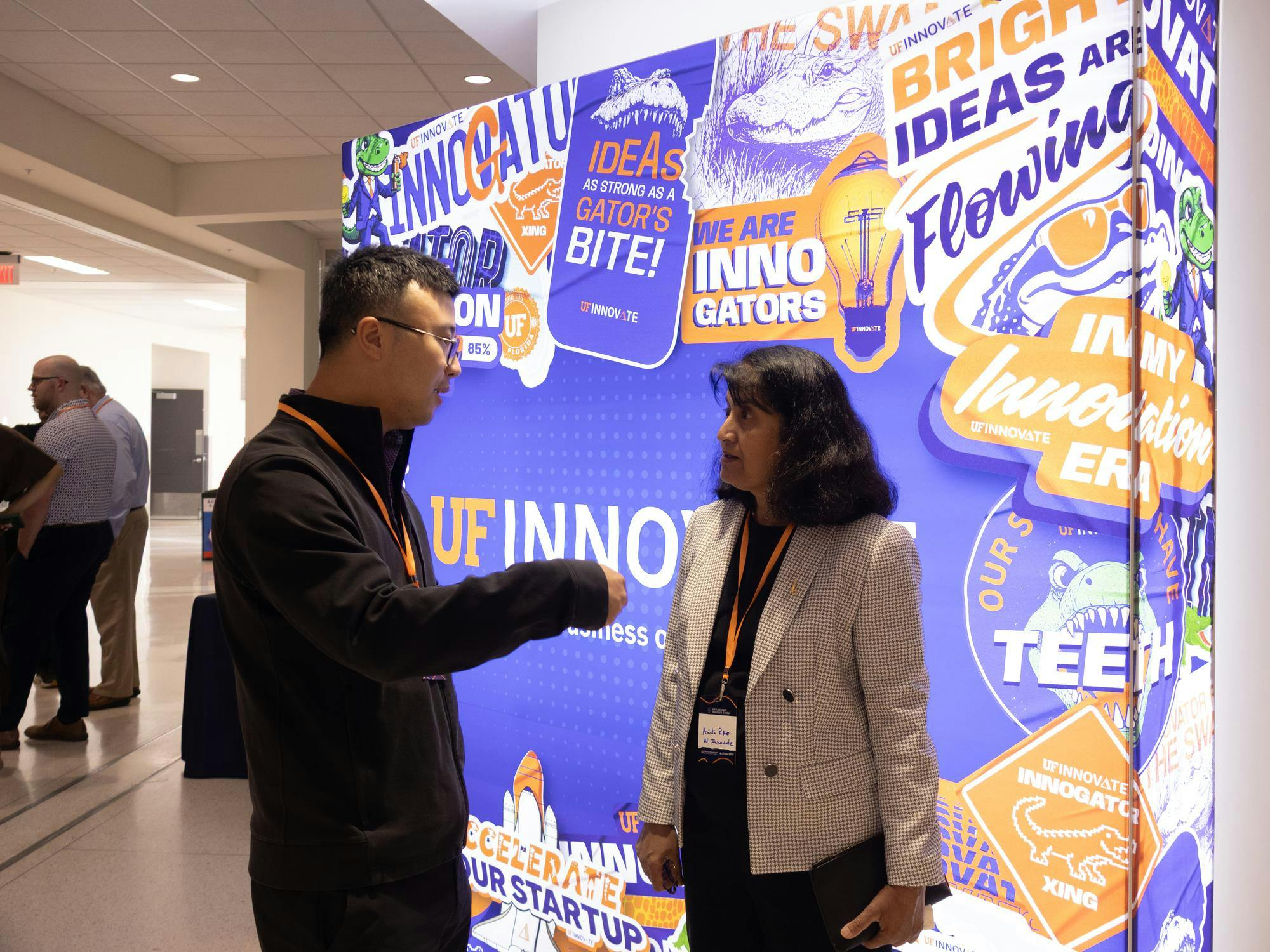 Anita Rao speaks to another attendee at Standing InnOvation in the Reitz Union Grand Ballroom, Wednesday, Oct. 21, 2026, in Gainesville, Fla.