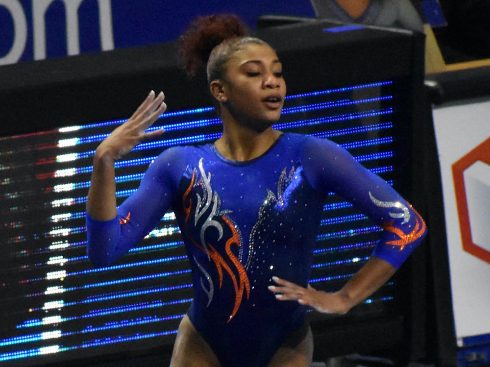 <p>UF gymnast Nya Reed competes in a home meet against Missouri Jan. 11, 2019. Reed announced she will return for her fifth year Friday.</p>
