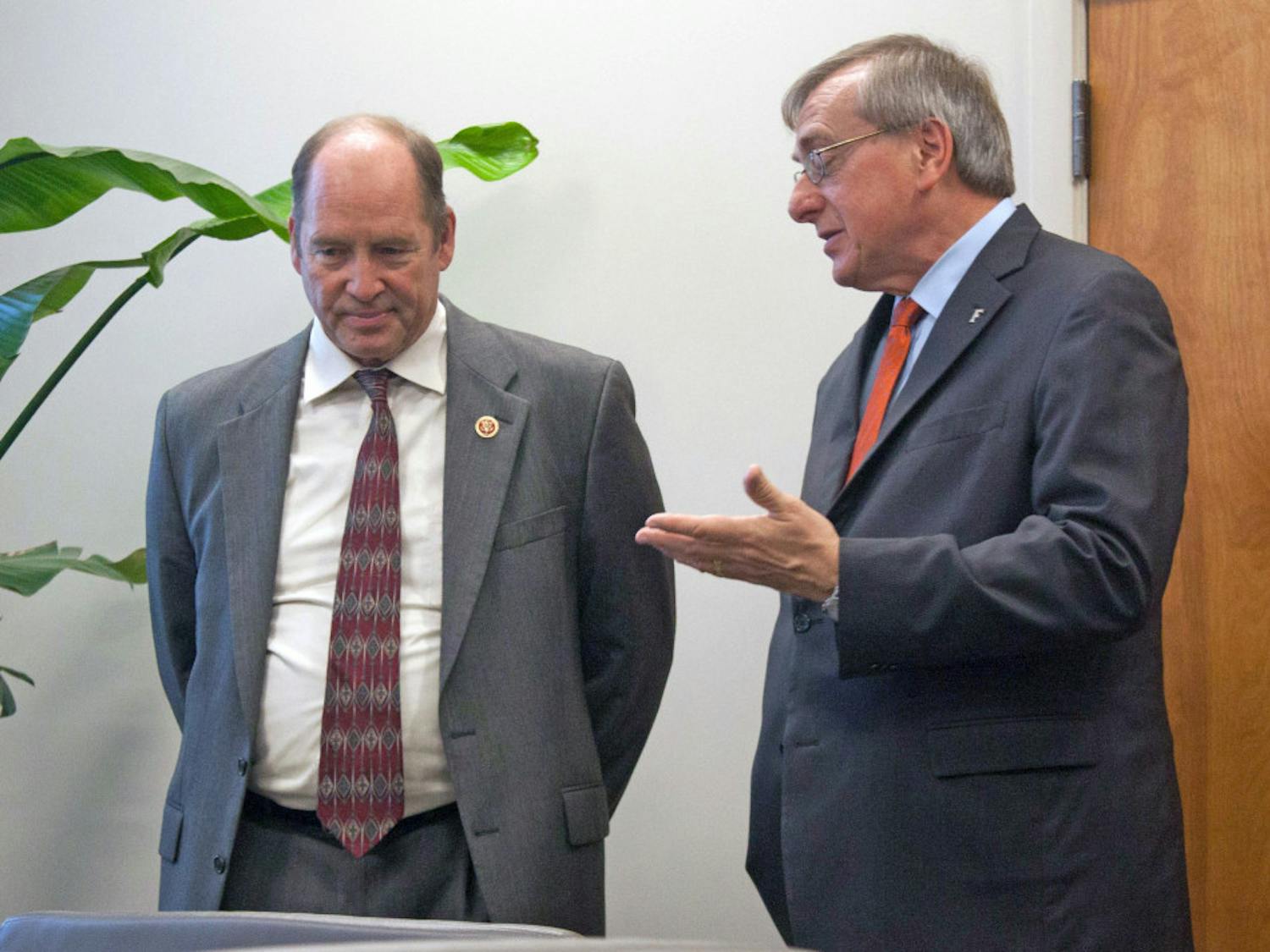 Congressman Ted Yoho and UF President Kent Fuchs discuss the process of the National Science Foundation conference before it begins. Fuchs invited Yoho to visit UF on Friday.