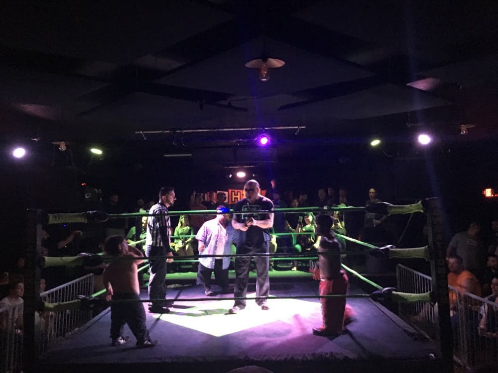 <p><span id="docs-internal-guid-d8b29bc0-9321-b56f-485c-eaf3bd37e373"><span>From left: Micro Championship Wrestling fighters Blixx, Loco and Huggy Cub get ready to face off as referees lay out the ground rules at the “midget wrestling” match at High Dive on Thursday night.</span></span></p>