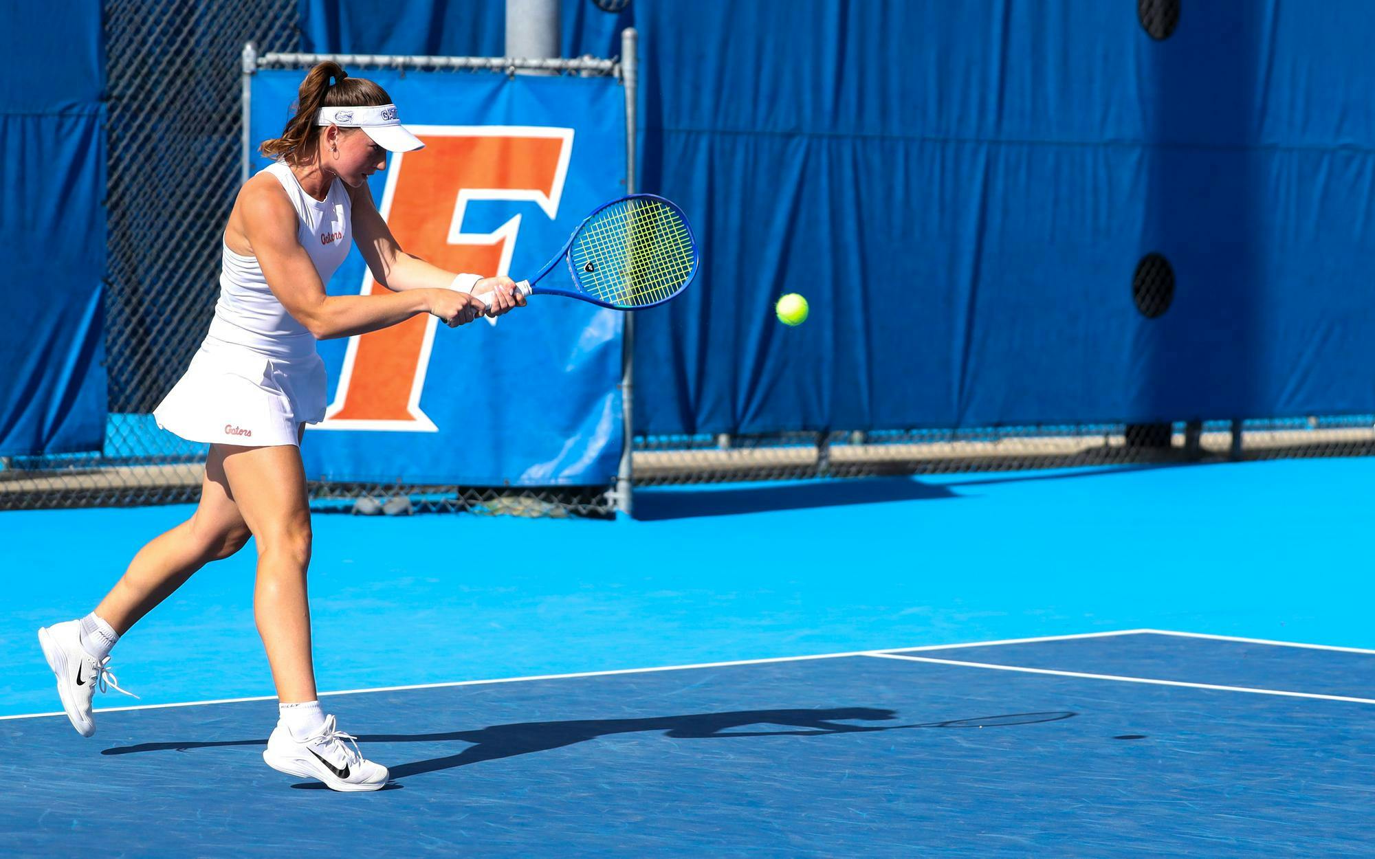 Florida’s Brooke Black hits the ball during an NCAA women’s doubles tennis match against Valeria Ray and Bridget Stammel of Vanderbuilt, Friday, April 10, 2026, in Gainesville, Fla.