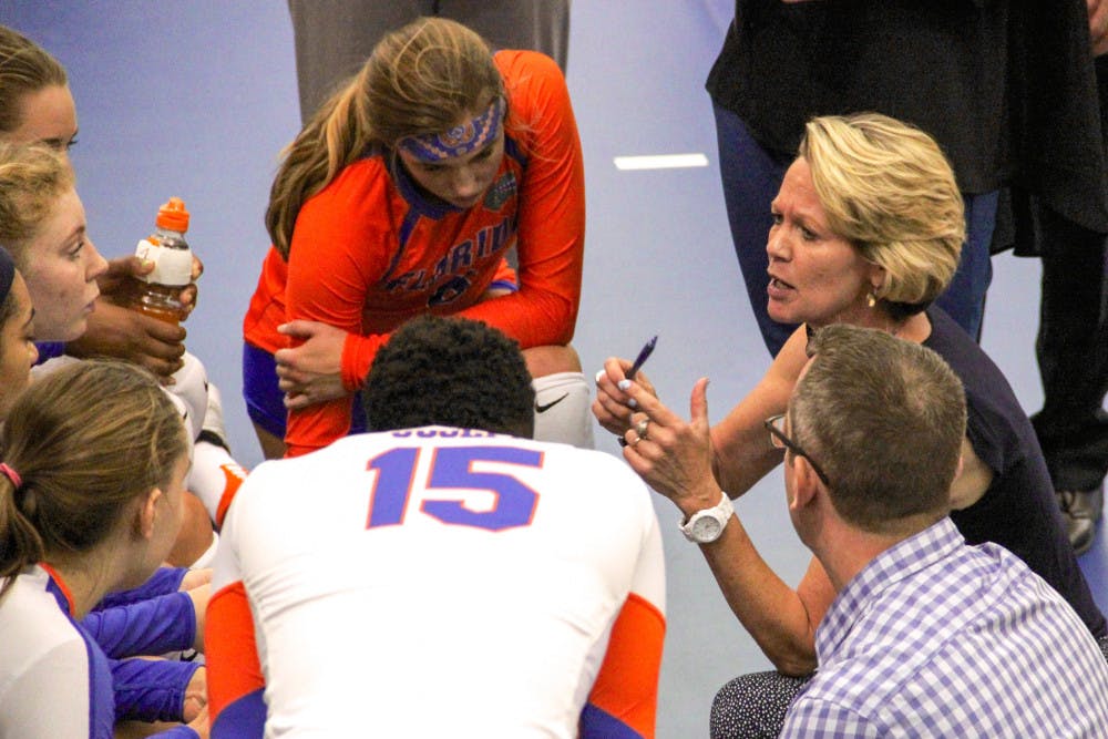 UF coach Mary Wise talks with her players during Florida's 3-1 win over Marshall on Sept. 17, 2016, in the Lemerand Athletic Center.  
