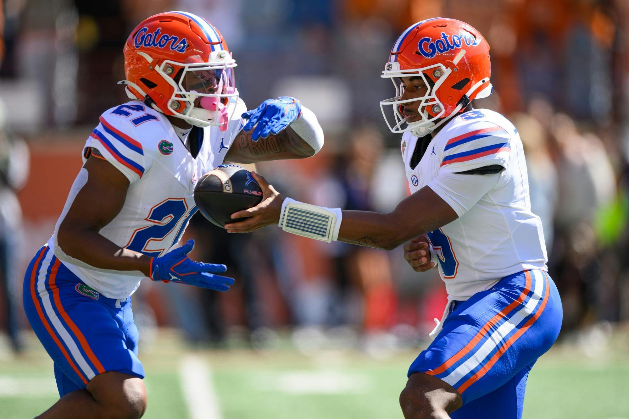 Florida quarterback Tramell Jones Jr. (9) hands off to running back Evan Pryor (21) during the first half of an NCAA college football game against Texas, Friday, Oct. 16, 2026, in Austin, Texas.