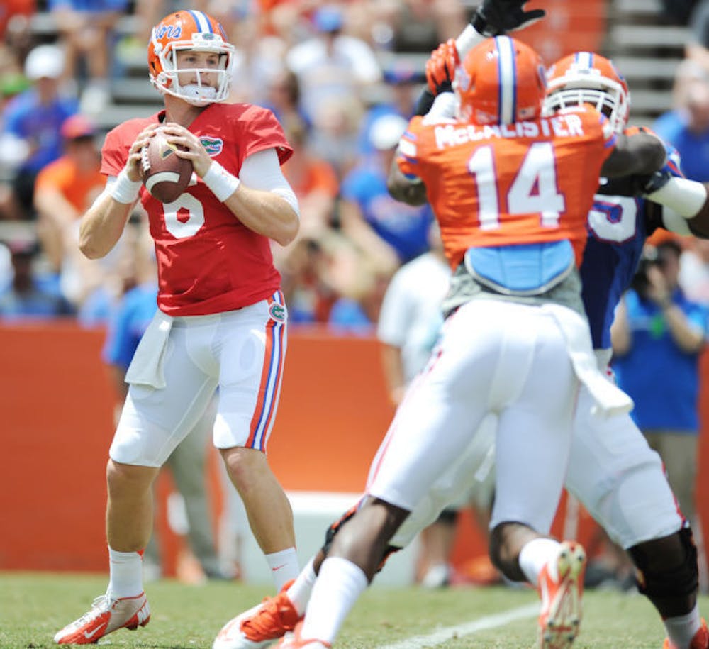 <p>Jeff Driskel attempts a pass during the Orange &amp; Blue Debut on April 12 in Ben Hill Griffin Stadium.</p>
