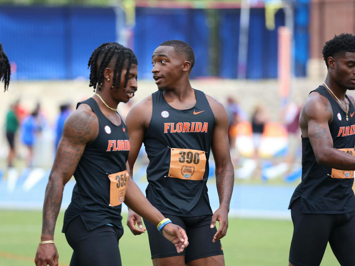 Members of the Florida men's track team talk during the Tom Jones Memorial April 14-15, 2023. 