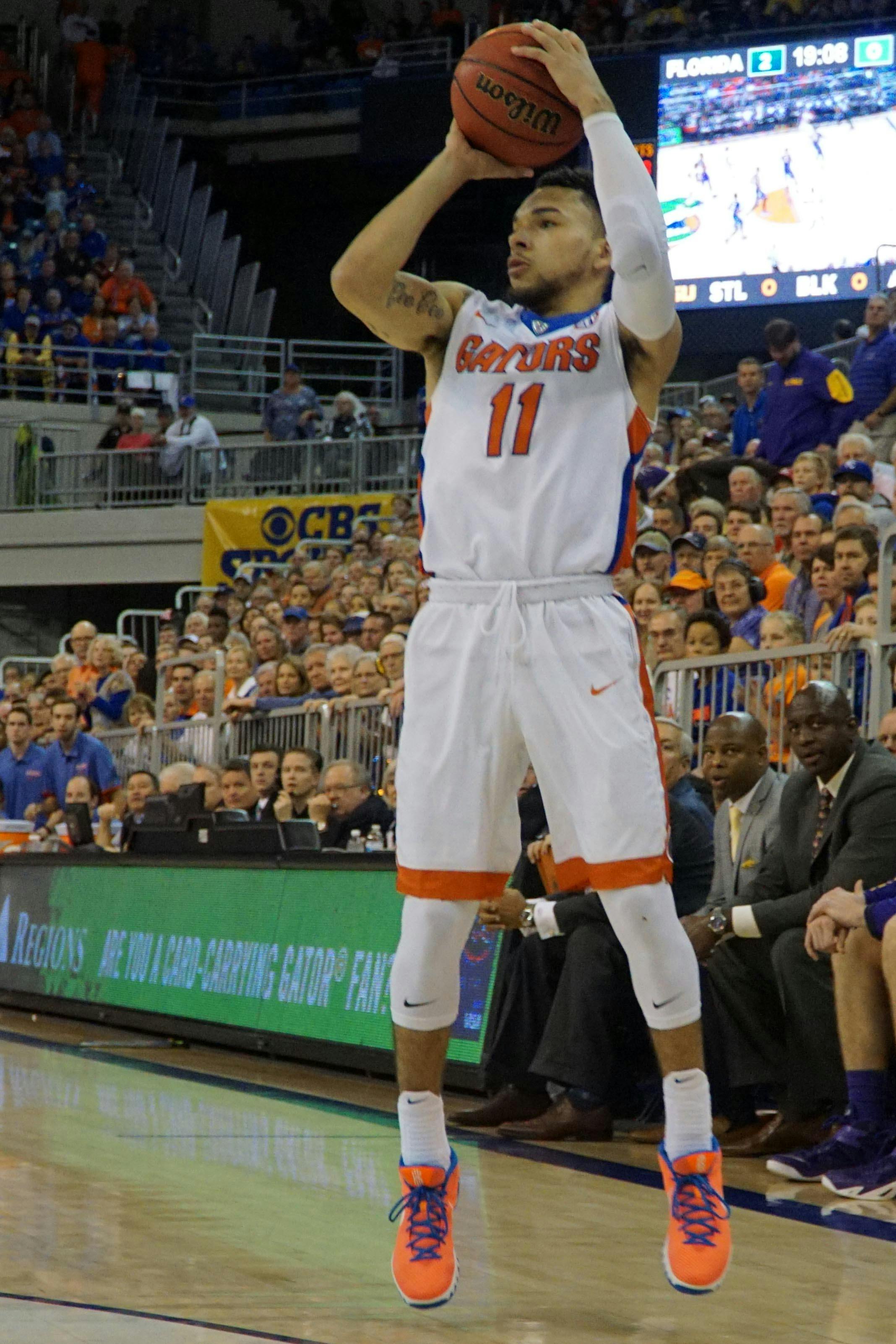UF guard Chris Chiozza shoots a three-pointer during Florida’s 68-62 win over LSU on Jan. 9, 2016, in the O’Connell Center.