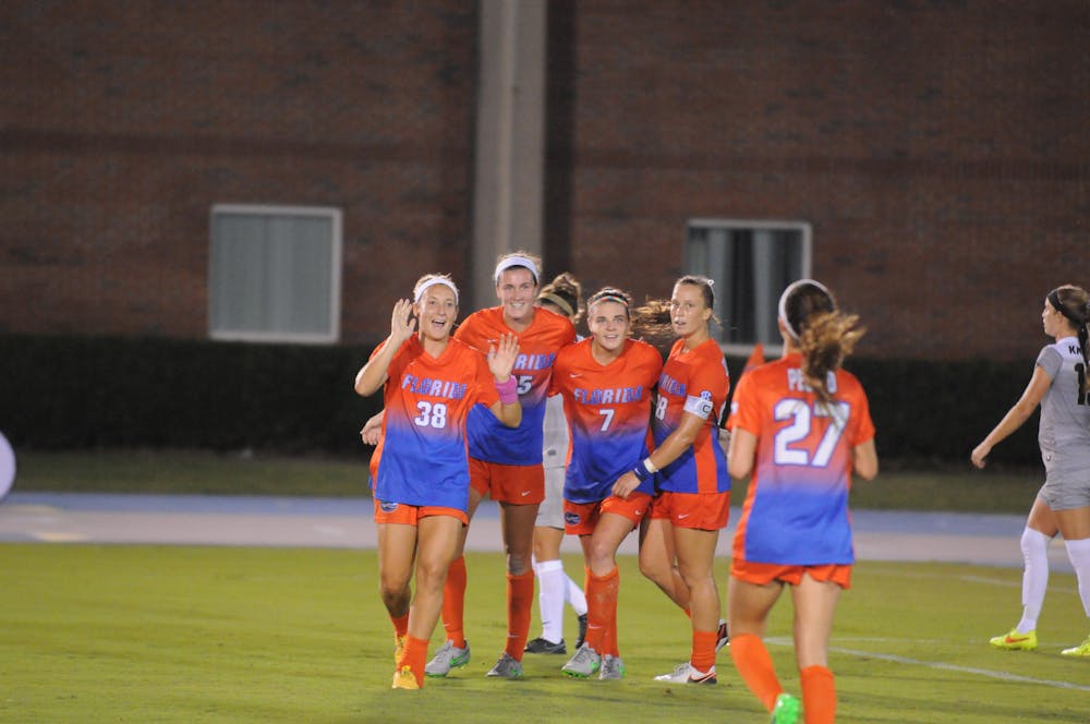 <p><span>Mayra Pelayo (27) runs to celebrate with her teammates during Florida's 3-2 win over UCF on Sept. 18, 2016, at James G. Pressly Stadium.</span></p>