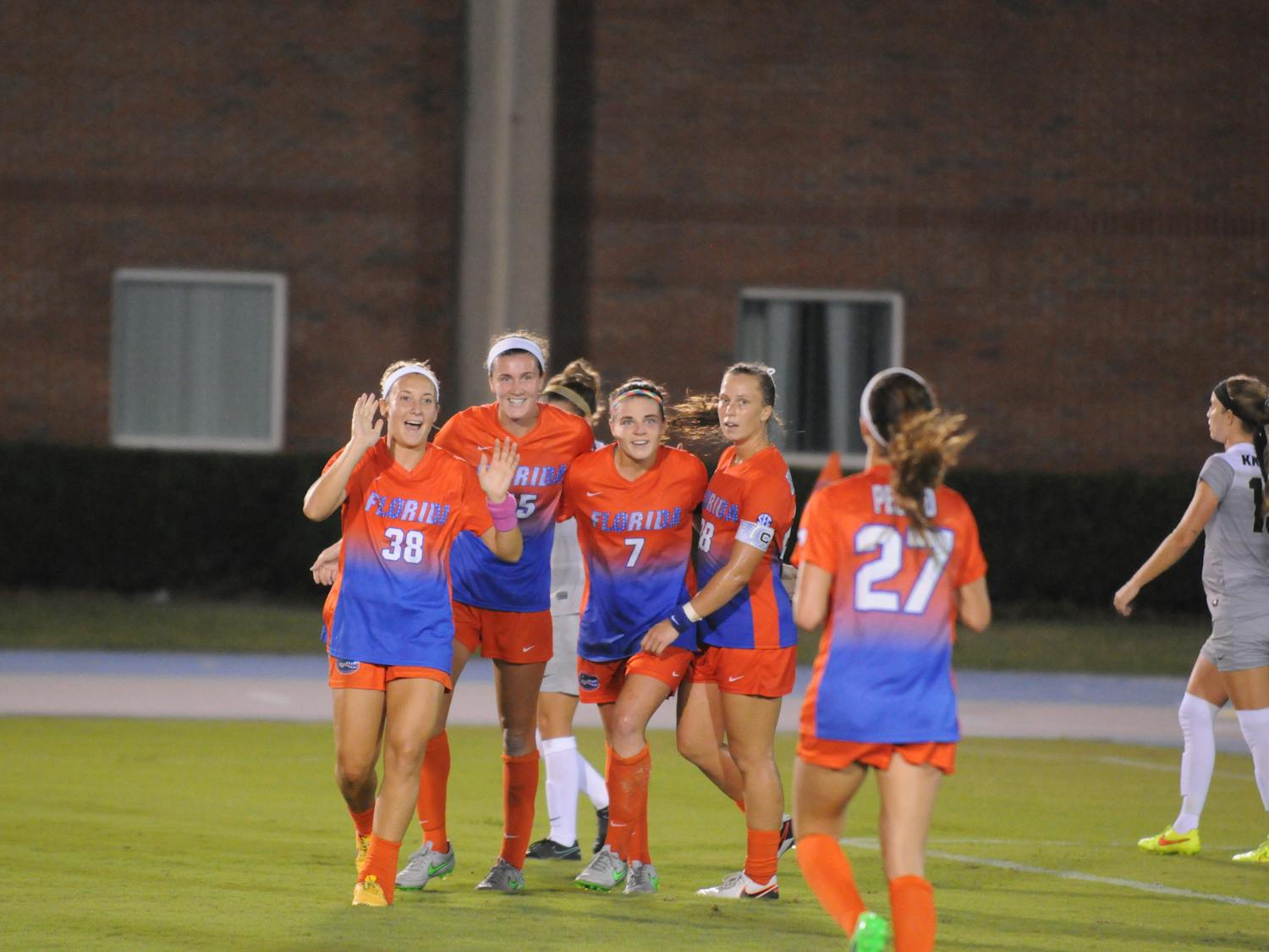 Mayra Pelayo (27) runs to celebrate with her teammates during Florida's 3-2 win over UCF on Sept. 18, 2016, at James G. Pressly Stadium.