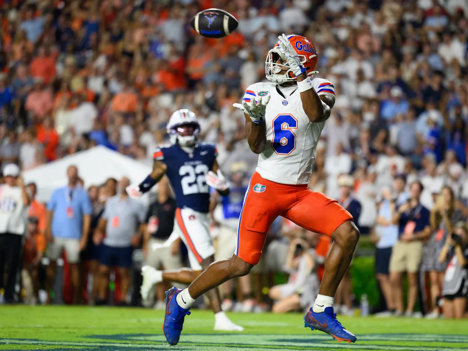 Florida wide receiver Dallas Wilson (6) catches a touchdown pass during the second half of an NCAA college football game against Auburn, Saturday, Sept. 19, 2026, in Auburn, Ala.
