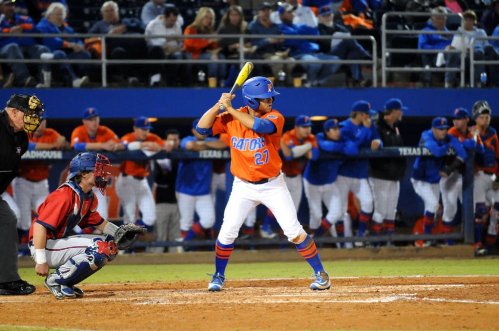 Nelson Maldonado bats during Florida's 2-1 win against Florida Atlantic on March, 22, 2016, at McKethan Stadium.
