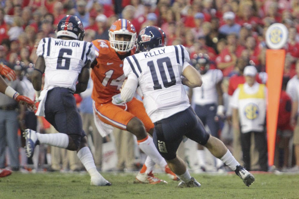 <p>UF defensive end Alex McCalister attempts to sack Ole Miss quarterback Chad Kelly during Florida's 38-10 win against the Rebels on Oct. 3, 2015, at Ben Hill Griffin Stadium.</p>