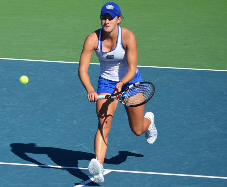 Kourtney Keegan attempts a volley during the Bedford Cup on Oct. 13, 2013, at the Ring Tennis Complex. Keegan won both of her singles matches in Florida’s opening weekend.