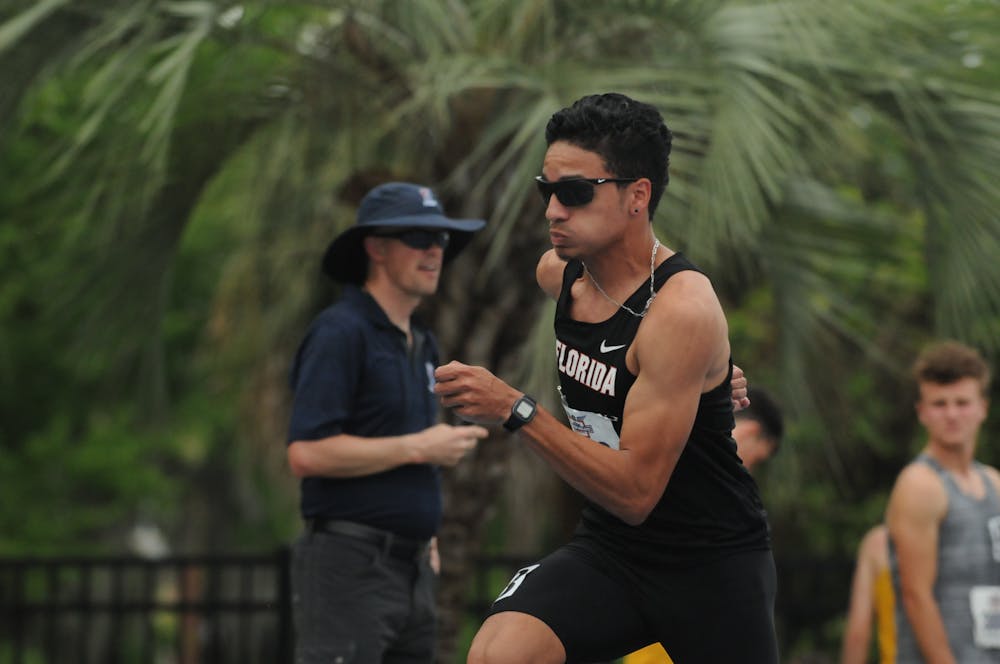 <p>Junior mid-distance runner Andres Arroyo competes in the 800 meters during the Florida Relays on April 1, 2016, at Percy Beard Track. </p>