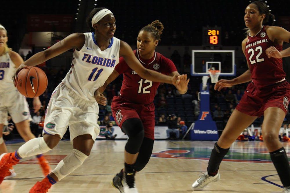 <p>UF guard Dyandria Anderson dribbles the ball in Florida's 81-62 loss to South Carolina on Jan. 8, 2017, in the O'Connell Center.&nbsp;</p>