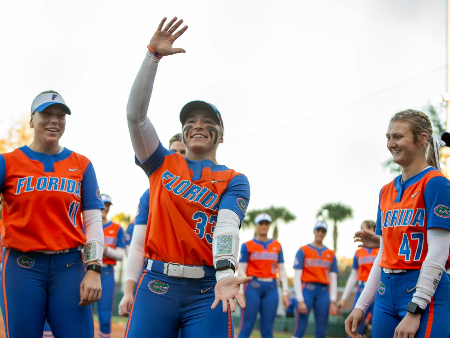 Korbe Otis does the Gator chomp before Florida softball's matchup with Oklahoma State on Feb. 20. Photo by Ryan Friedenberg