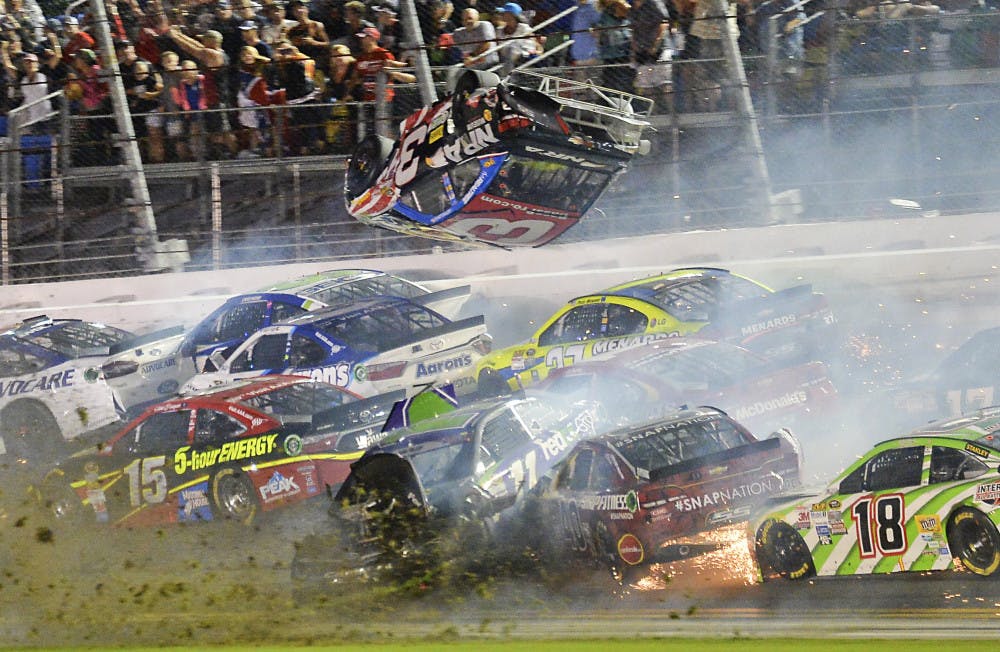 Austin Dillon (3) goes airborne as he was involved in a multi-car crash on the final lap of the NASCAR Sprint Cup series auto race at Daytona International Speedway in Daytona Beach, Florida.