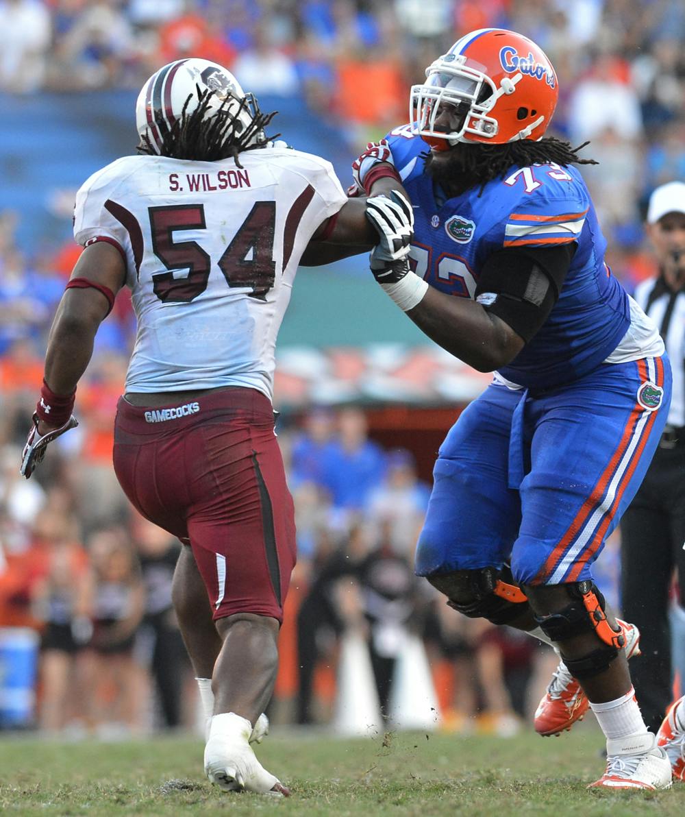 Left tackle Xavier Nixon (73) blocks South Carolina linebacker Shaq Wilson (54) during Florida’s 44-11 win against the Gamecocks on Saturday in Ben Hill Griffin Stadium.