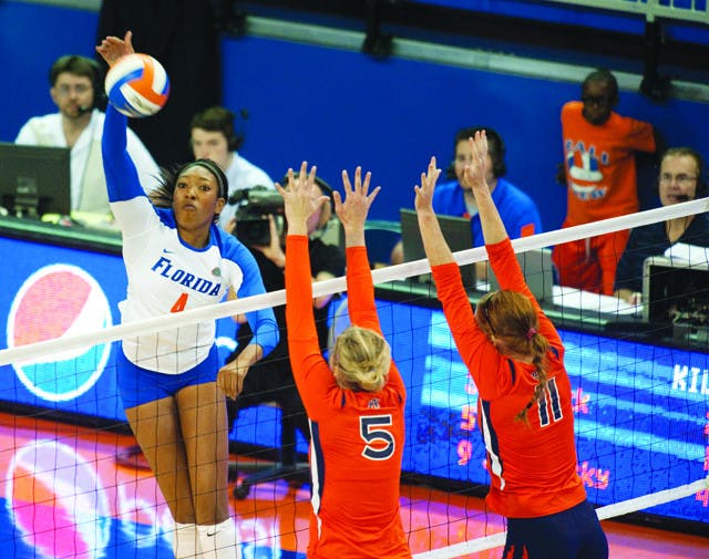 Florida junior right-side hitter Tangerine Wiggs (left) and the Gators travel to Cedar Falls, Iowa, tonight to take on a youthful Missouri team in the opening round of the NCAA Championship.