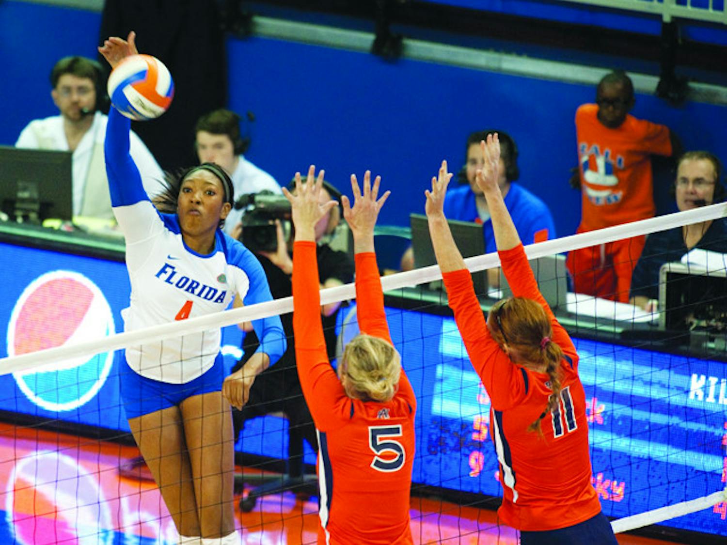 Florida junior right-side hitter Tangerine Wiggs (left) and the Gators travel to Cedar Falls, Iowa, tonight to take on a youthful Missouri team in the opening round of the NCAA Championship.