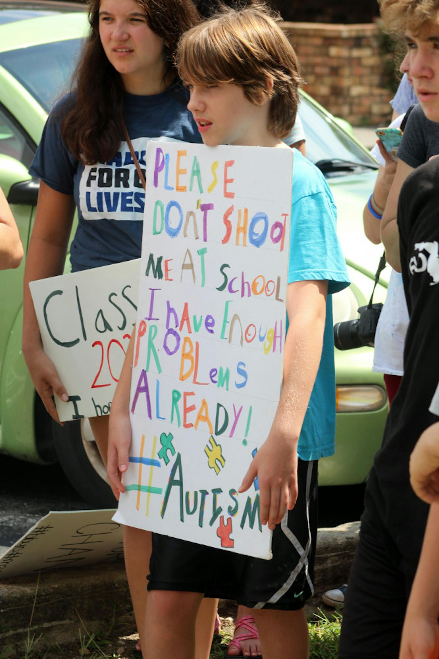 Children, students, and Gainesville residents rallied alongside survivors of the Parkland school shooting on July 26, 2018 at Congressman Ted Yoho's office.  The event was part of the MSD "Road to Change" tour in which students are calling for their local representatives to "say no" to the NRA.  