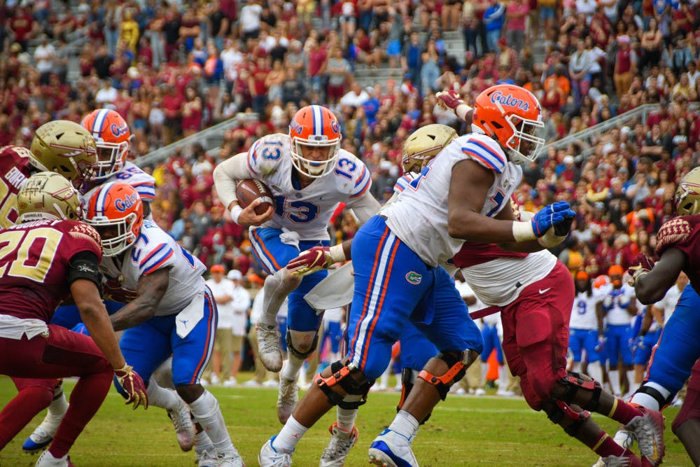 <p>Quarterback Feleipe Franks (13) threw for 254 yards and three touchdowns in Saturday's 41-14 win over Florida State. </p>