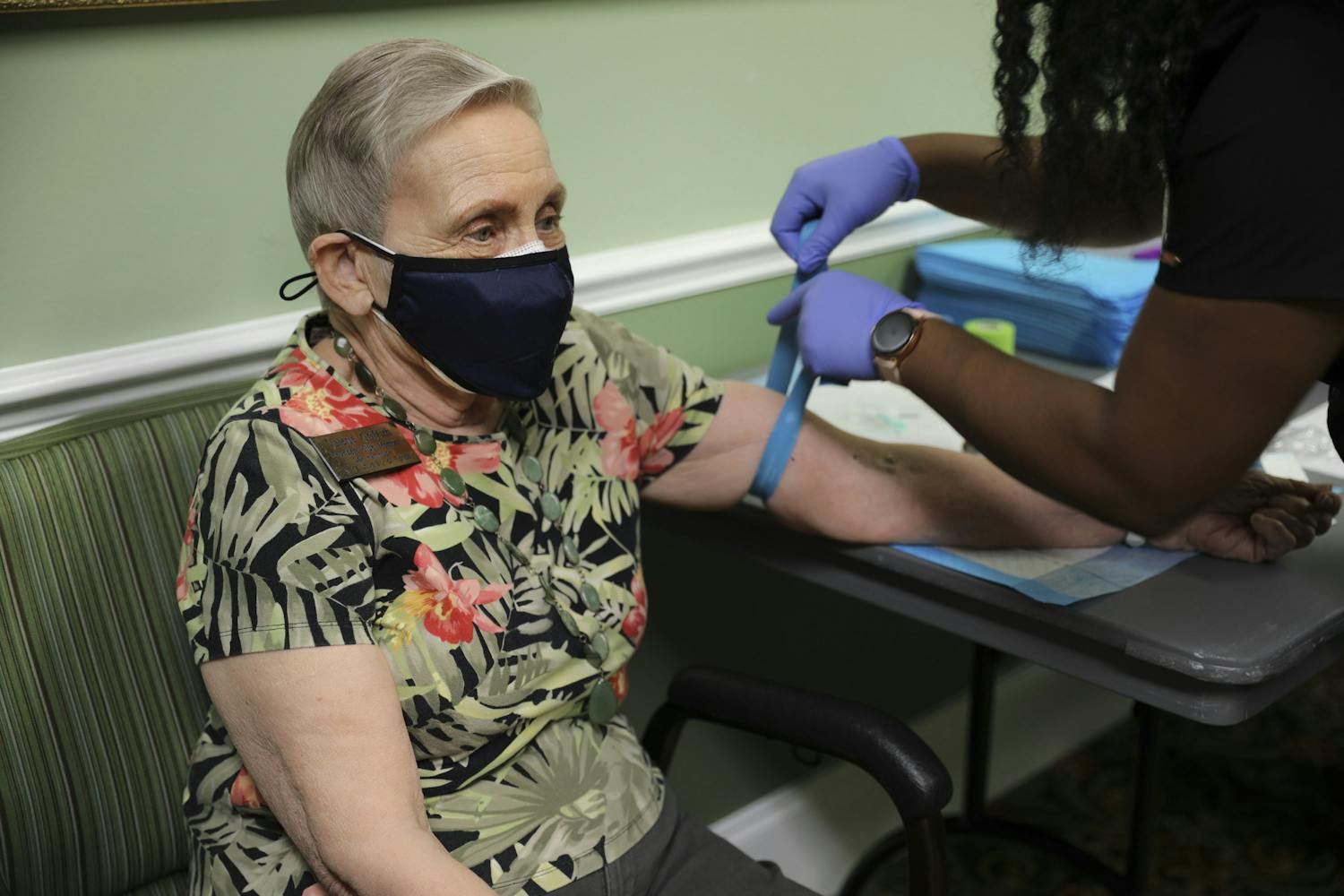 Valerie Griffith, a Founders Club member of Oak Hammock at the University of Florida, participates in the CITRUS Study as a nurse puts a tourniquet on her arm on Wednesday, June 9, 2021. 