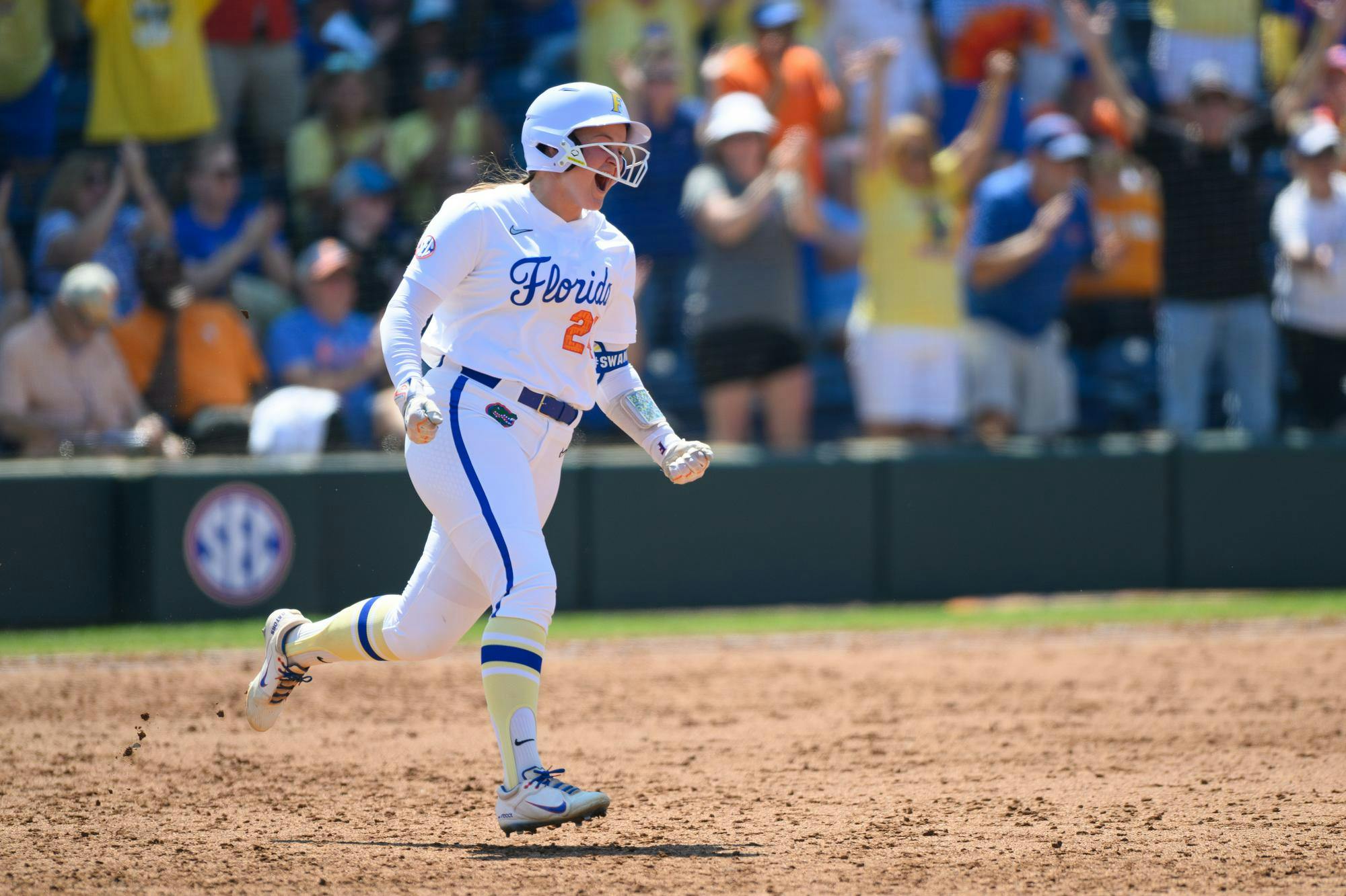 Florida designated hitter Madison Walker (24) runs to second after a home run during an NCAA softball game against Tennessee, Saturday, March 21, 2026, in Gainesville, Fla.