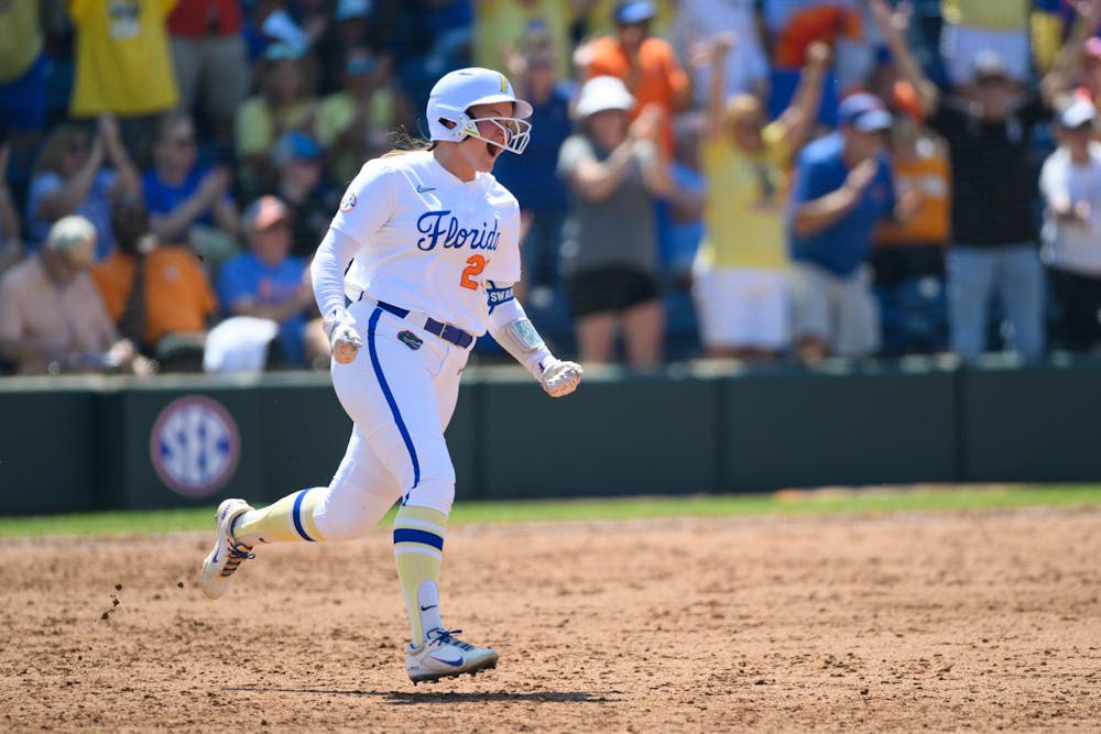 Florida designated hitter Madison Walker (24) runs to second after a home run during an NCAA softball game against Tennessee, Saturday, March 21, 2026, in Gainesville, Fla.