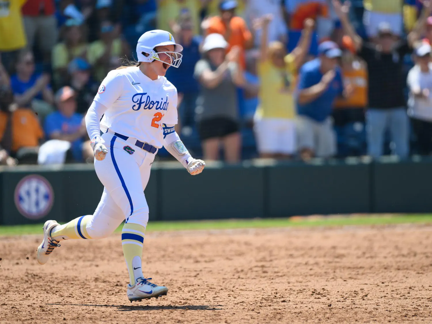 Florida designated hitter Madison Walker (24) runs to second after a home run during an NCAA softball game against Tennessee, Saturday, March 21, 2026, in Gainesville, Fla.