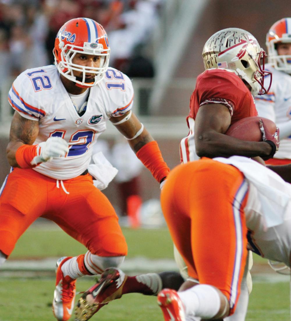 <p>Antonio Morrison goes for a tackle during Florida’s 37-26 win against Florida State on Nov. 24. Morrison was arrested for the second time in five weeks on Sunday.</p>