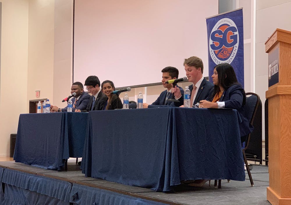 <p>More than 200 students, watched as the Impact candidates — Michael Murphy for Student Body president, Sarah Abraham for Student Body vice president and Santiago Gutierrez for Student Body treasurer — and Inspire Party candidates — Chou, Gouthami Gadamsetty for Student Body vice president and Mackintosh Joachim for student body treasurer — debated.</p>
