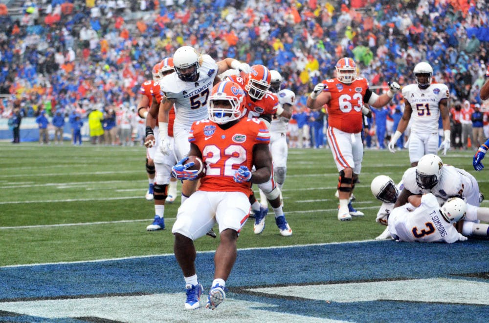 <p>Adam Lane rushes into the end zone for a touchdown during Florida's 28-20 win against East Carolina on Jan. 3 in the Birmingham Bowl at Legion Field.</p>