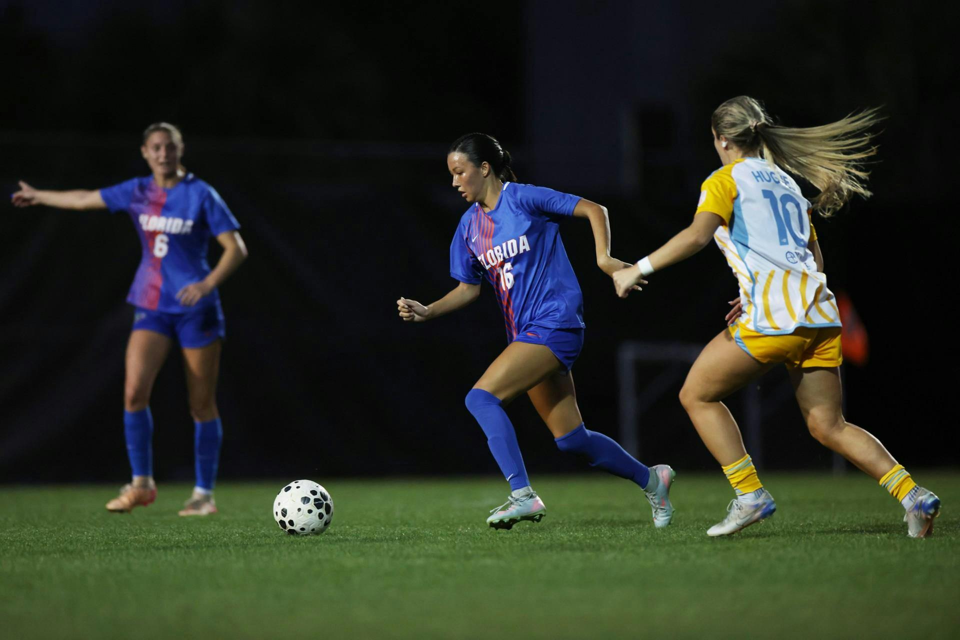 Freshman midfielder Courtney Hogan pursues a ball for Florida soccer.