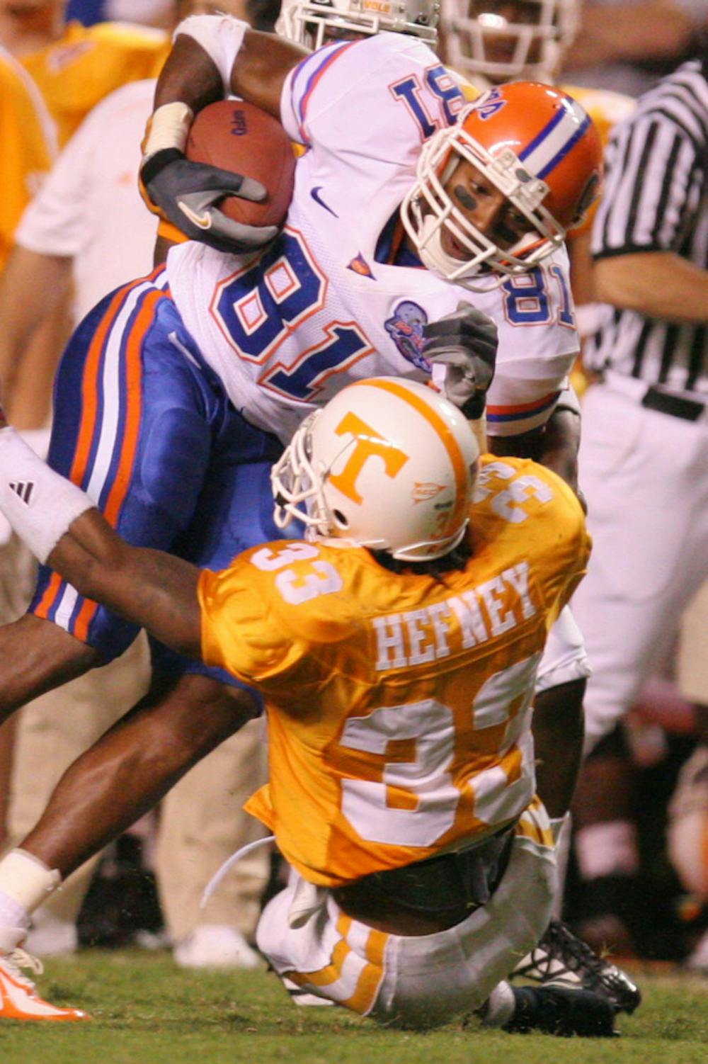 <p>Former Gators wide receiver Dallas Baker (81) breaks a tackle during Florida’s 21-20 victory against Tennessee on Sept. 16, 2006 in Neyland Stadium in Knoxville, Tenn.</p>