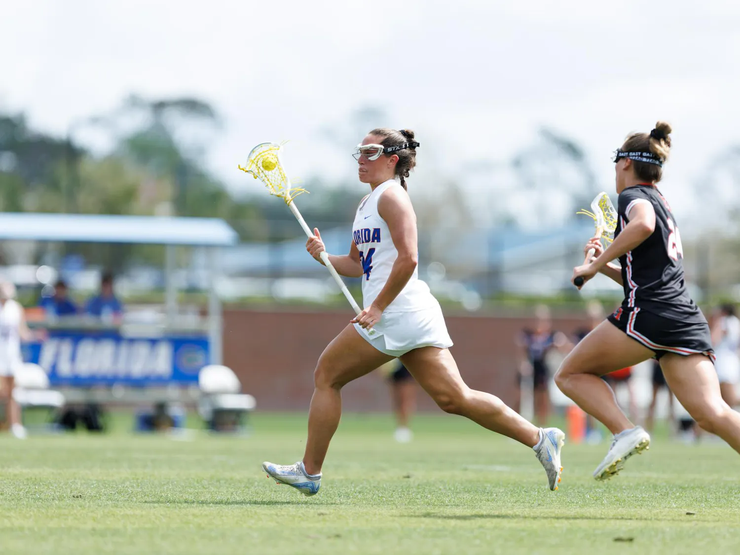 Florida midfielder Gabbi Koury (24) runs with the ball during the second quarter of an NCAA women’s lacrosse gmae against Mercer, Saturday, March 07, 2026, in Gainesville, Fla.