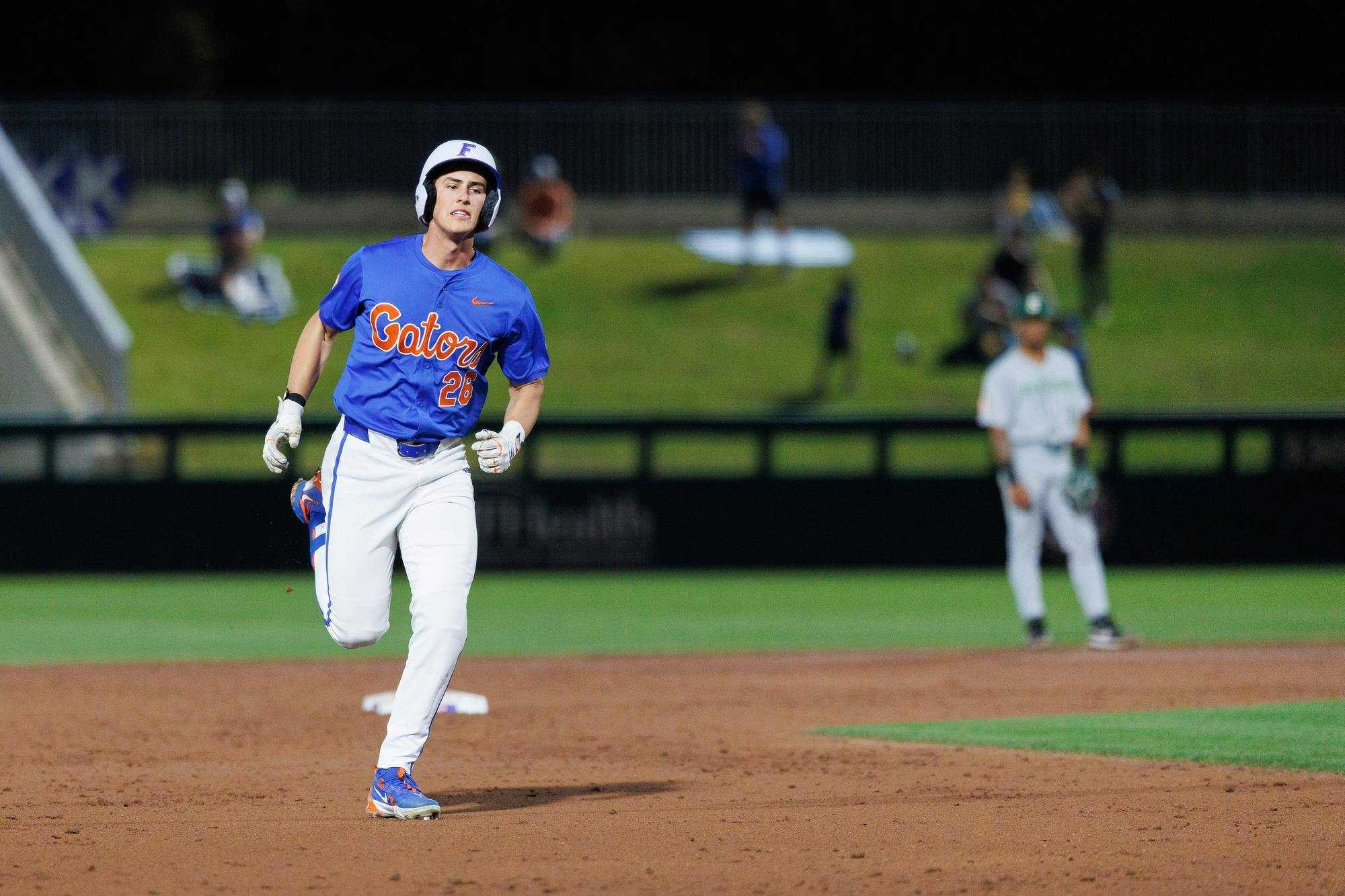 Florida outfielder Cash Strayer (26) runs the bases after hitting a homerun during an NCAA college baseball game against Stetson, Wednesday, Feb. 18, 2026, in Gainesville, Fla.