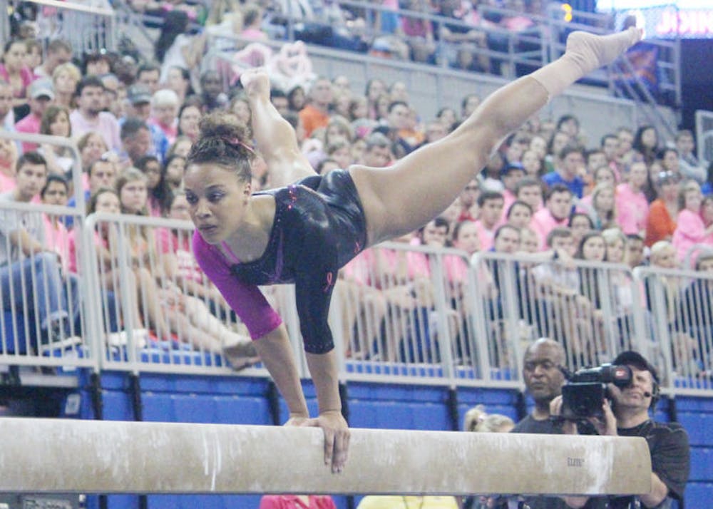<p>Kytra Hunter performs a balance beam routine during Florida’s 198.125-197.625 over LSU on Feb. 21. Hunter won the balance-beam title at the Southeastern Conference Championships, but the Gators finished in second — behind the Crimson Tide.</p>