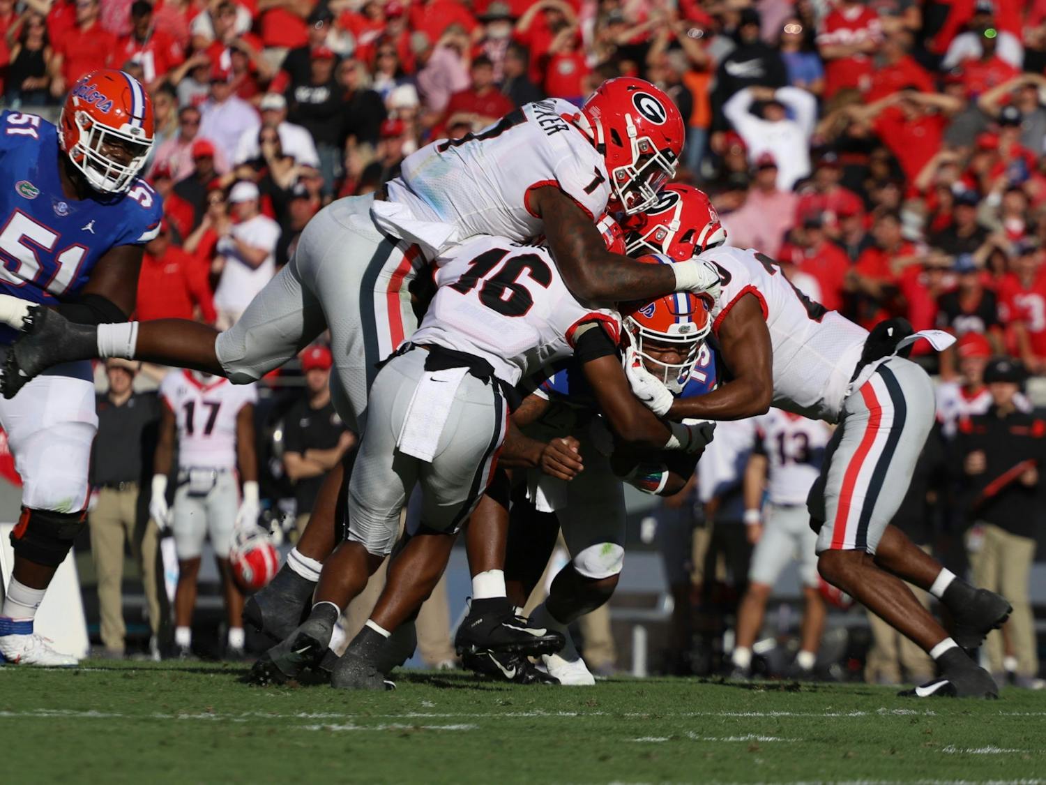 Georgia defenders swarm Florida quarterback Anthony Richardson during the first half of the Gators' 34-7 loss to Georgia on Oct. 30, 2021.