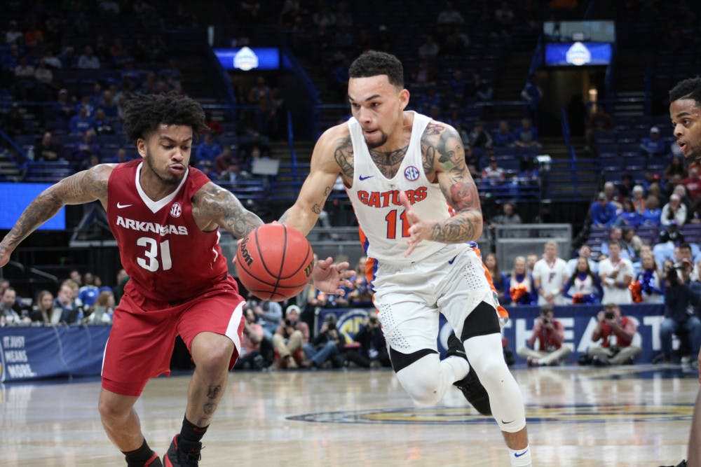 <p>Florida guard Chris Chiozza drives to the basket during Florida's 80-72 loss to Arkansas on Friday in the quarterfinals of the SEC Tournament.</p>