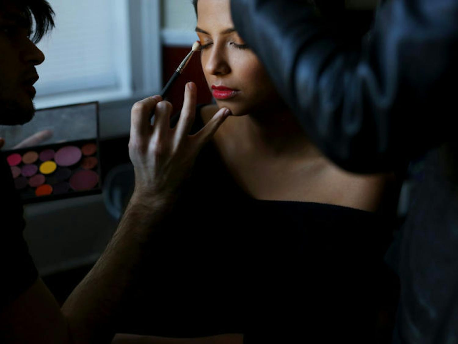 Gainesville Fashion Week model Tamima Mehrotra sits through hair and makeup before an early-season editorial photo shoot last month. Hair: Nicole Collazo. Makeup: Niko Pifferetti