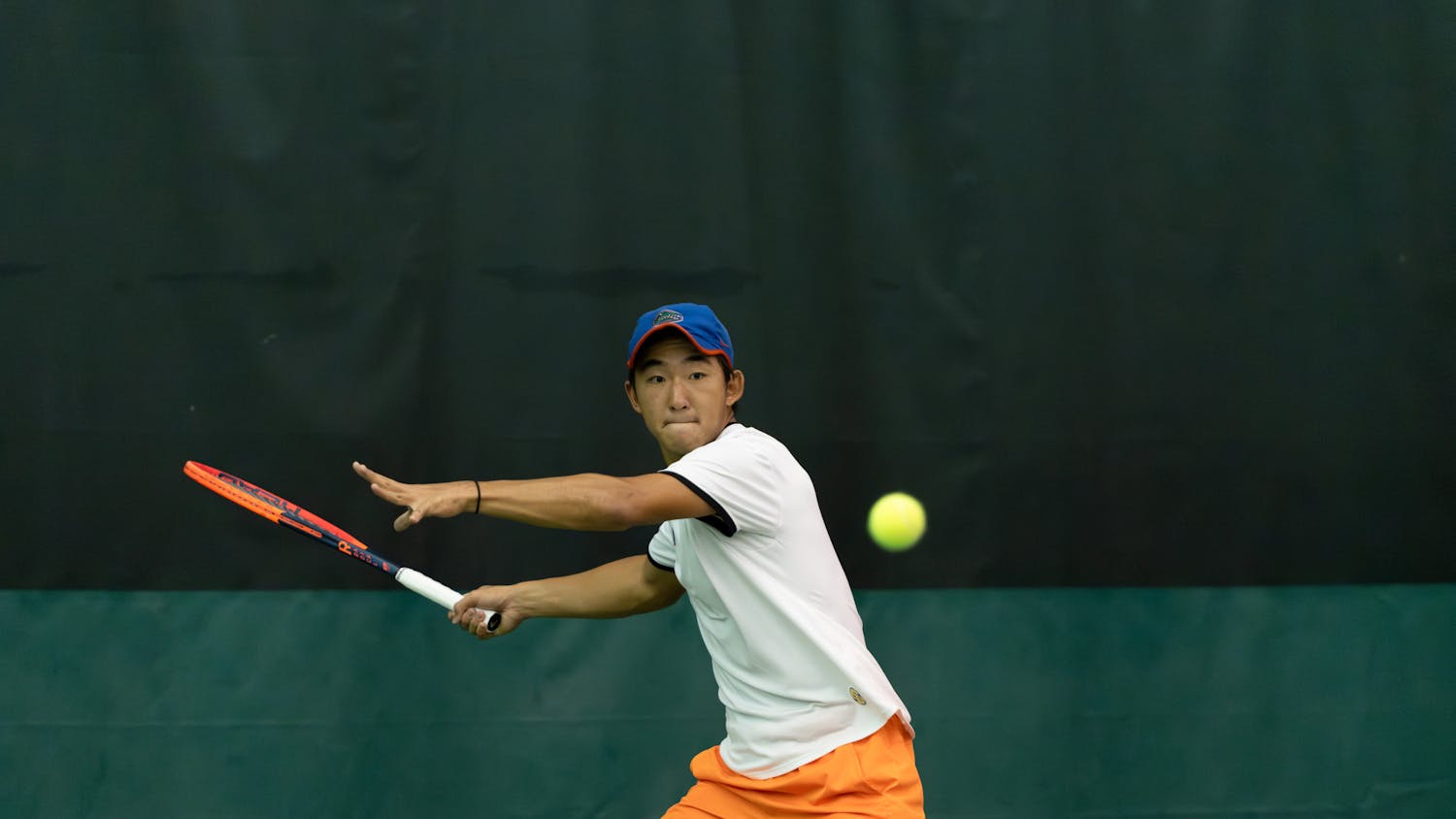 Gators men's tennis freshman Jeremy Jin goes to return the ball in the team's win over Ole Miss on Friday, March 22, 2024. 