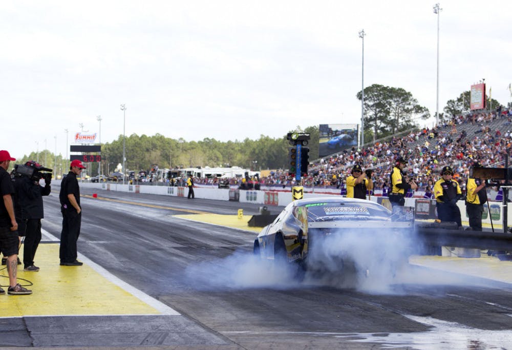 Kevin Fiscus, driving a 2012 Mustang, takes off from the starting line. The Pro Modified car reached speeds up to 246 mph.