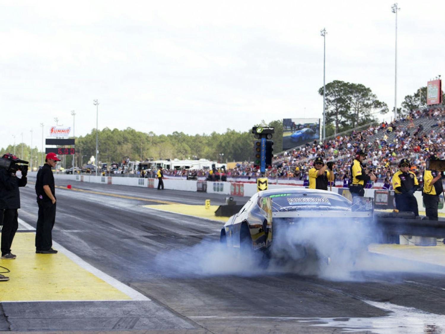 Kevin Fiscus, driving a 2012 Mustang, takes off from the starting line. The Pro Modified car reached speeds up to 246 mph.