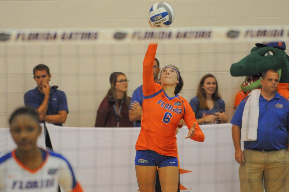 <p>Caroline Knop serves during Florida's 3-0 win over Jacksonville at the Lemerand Athletic Center on Sept. 16, 2016.</p>