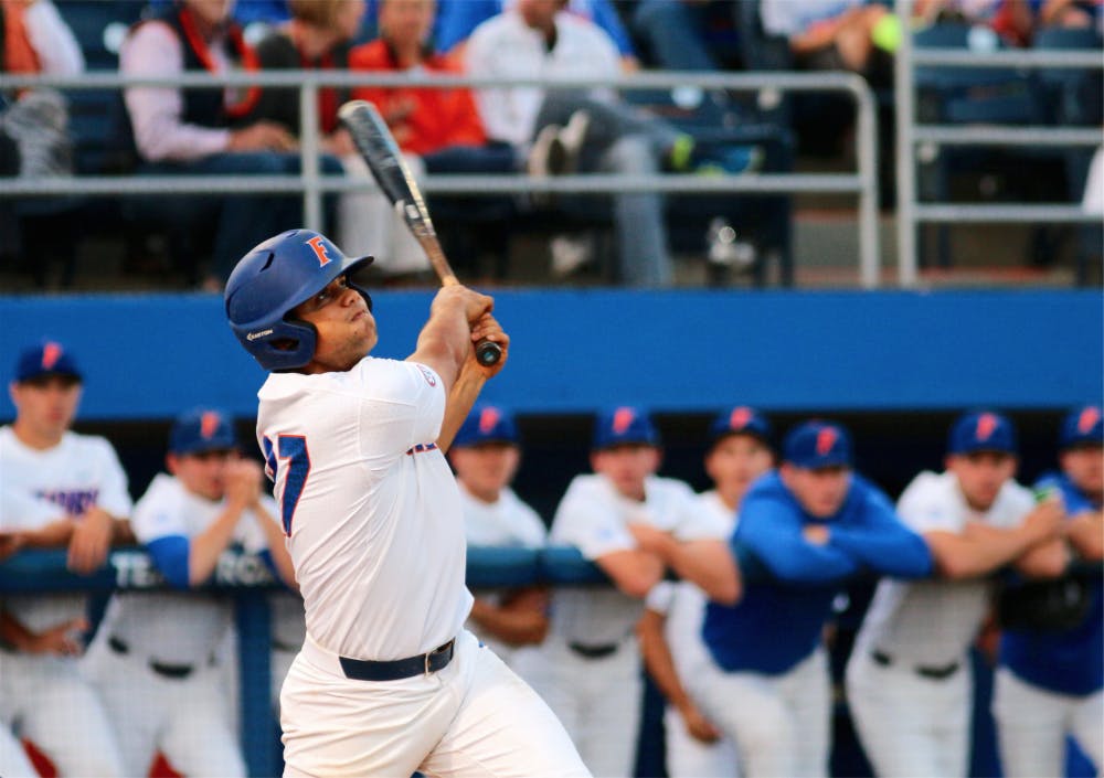 <p>Nelson Maldonado swings at a ball during Florida's win over LSU on Friday, March 24, 2017, at McKethan Stadium. </p>