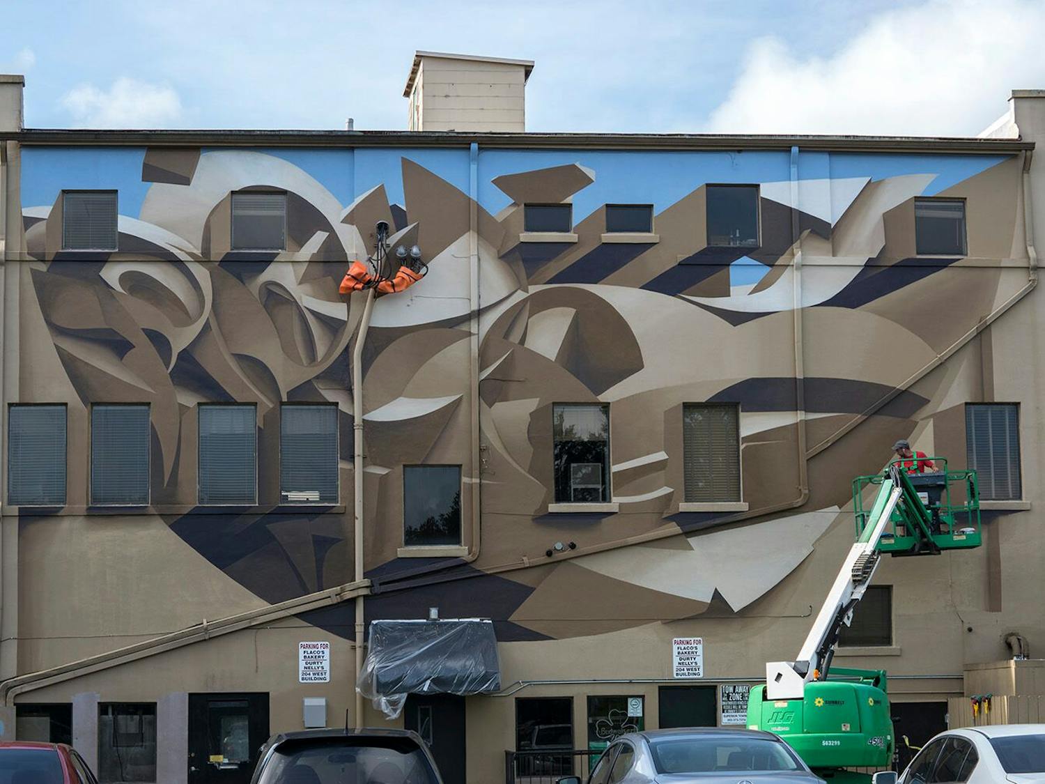 Muralist Manuel Di Rita finished the 3D-painted mural with acrylics Wednesday. The optical illusion mural took a week to complete.